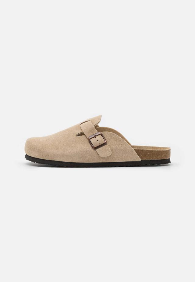 Pier One unisex slip-in i beige läder